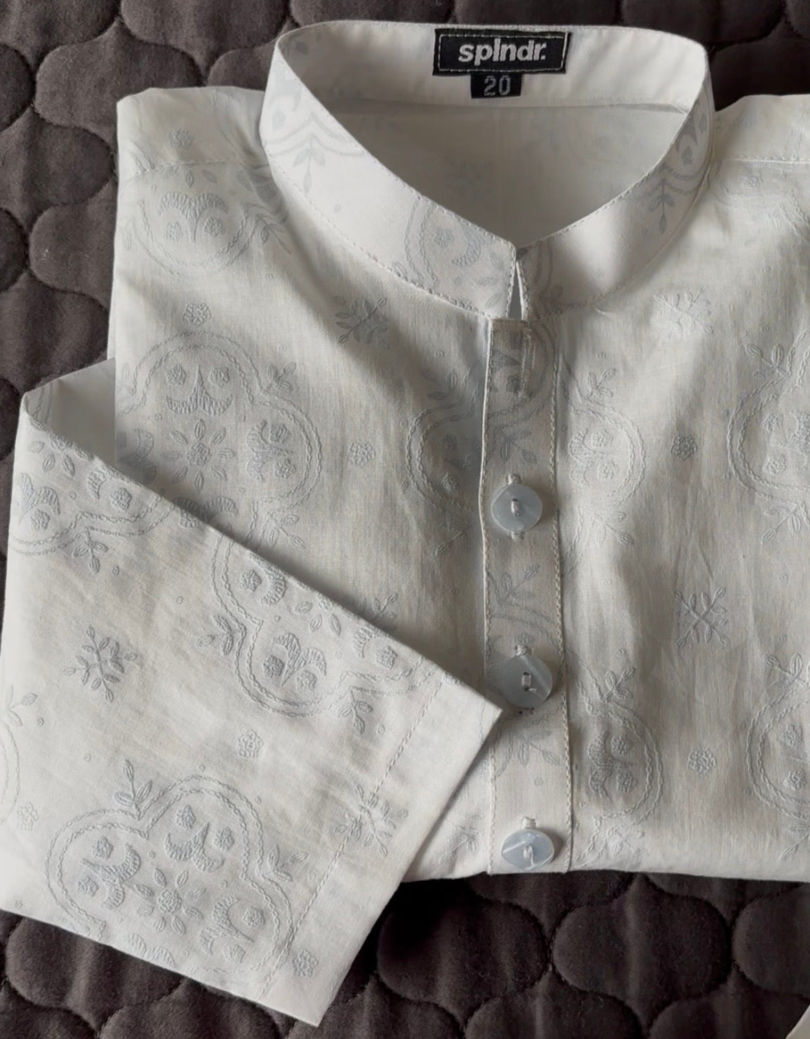 WHITE EMBOSSED